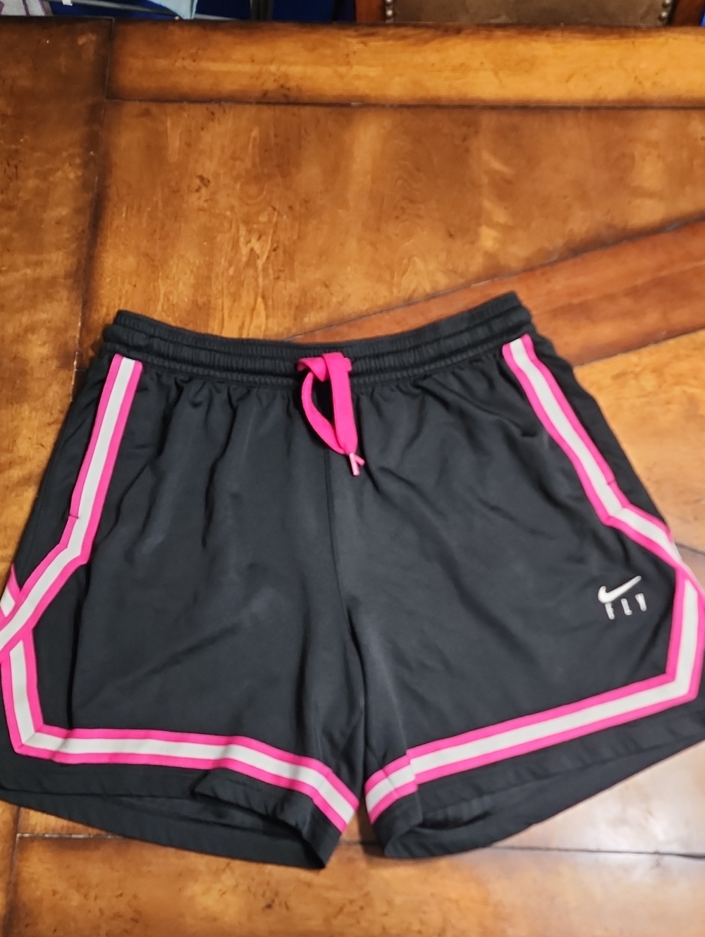 L Nike Women’s Black Athletic Shorts with Pink Trim